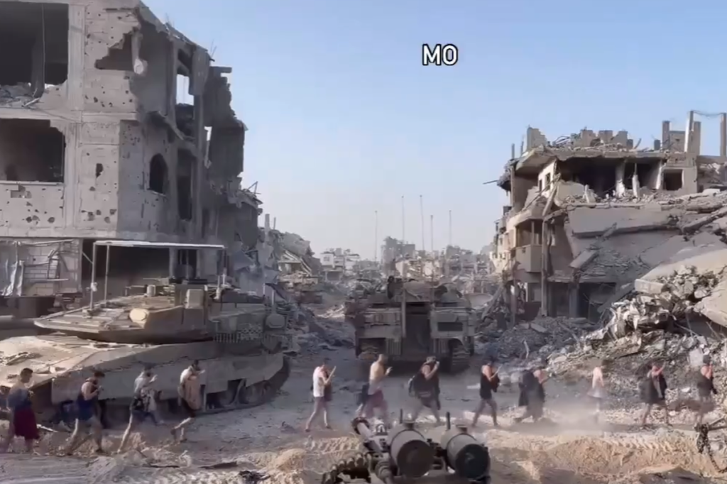 Screenshot of a video shared on social media following the Israeli raid on Kamal Adwan Hospital showing doctors and patients forced to leave the hospital on foot at gunpoint.